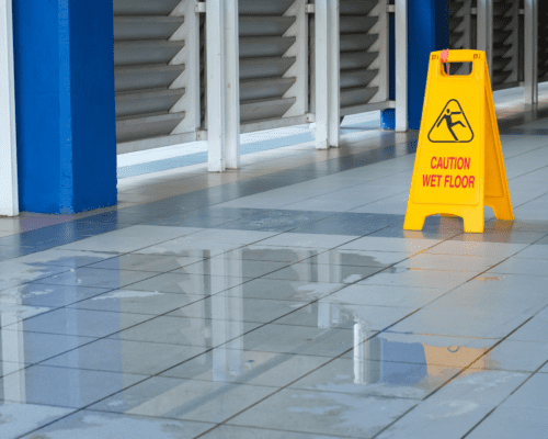 A slip and fall sign in a mall